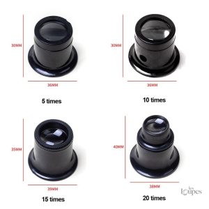 Quatre loupes d'horloger avec différents grossissements pour l'observation